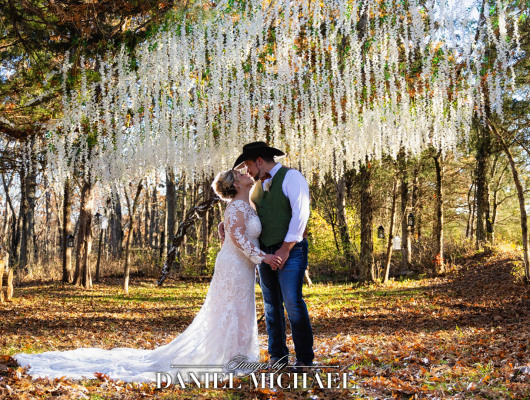 Couple standing in Fall woods